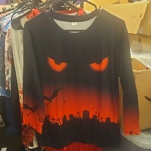 Halloween Kids Shirt with Spooky Eyes Design